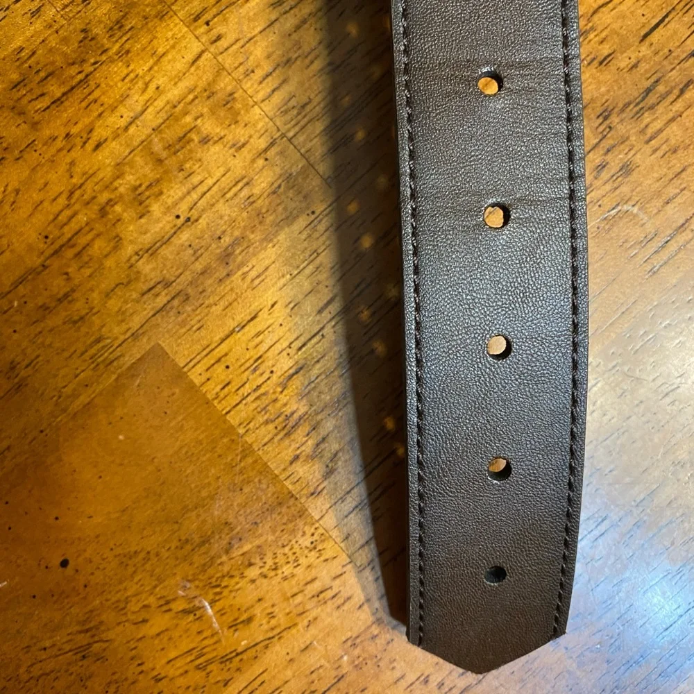 Faux leather belt. Size 40–44.